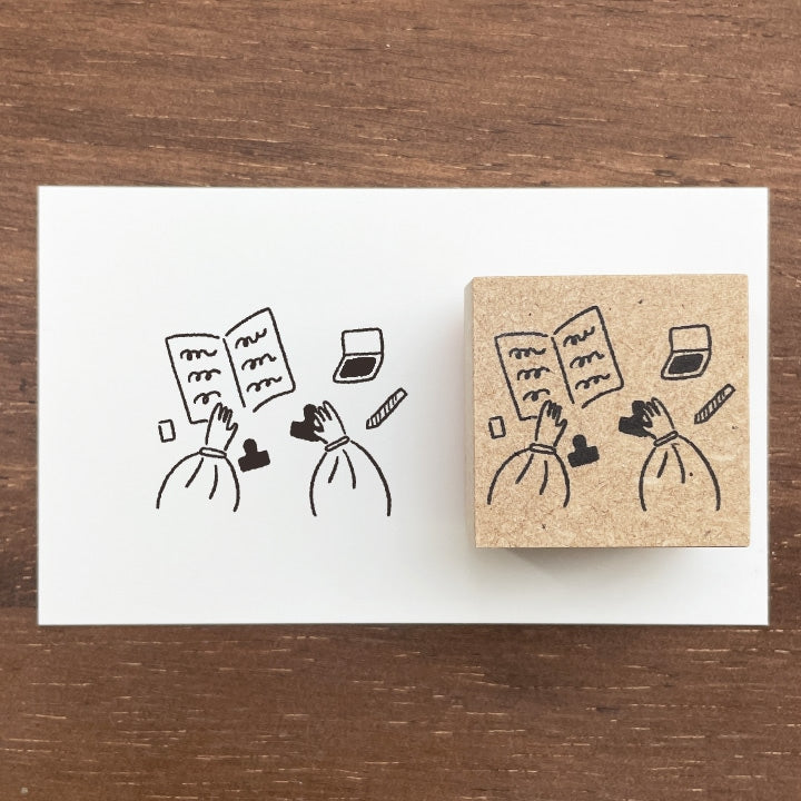 Bring a touch of charm to your journaling with this adorable Marl‑chan wooden stamp from Stamp Marche. Featuring the brand’s signature sign girl, this illustration stamp adds personality and warmth to planners, letters, scrapbooks, and creative projects.
Each stamp is crafted with a solid wooden mount and high‑quality rubber, giving you crisp, clean impressions every time. Whether you’re decorating daily spreads or adding a cute accent to handmade cards, Marl‑chan brings a delightful, whimsical feel to yo