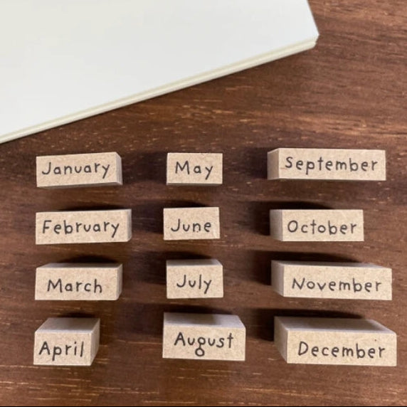 Stamp Marche Planner Wooden Stamp Set - Months
Add a touch of charm and structure to your planning with this weekday wooden stamp set. Perfect for journals, planners, calendars, and creative projects, these stamps make it easy to mark days of the week with a neat, consistent look. Whether you're organizing schedules, creating weekly spreads, or decorating your planner, this set adds both function and personality to your routine.
Made in Japan with high‑quality wood and rubber, it delivers crisp impression