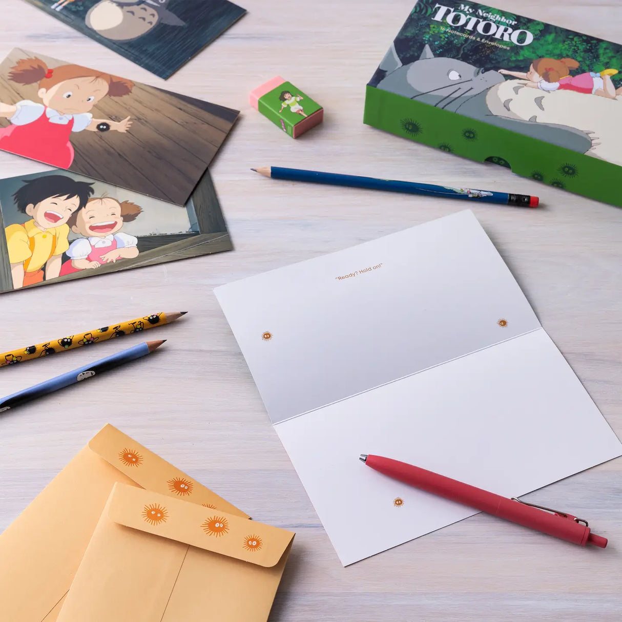 Celebrate friendship and connection with these notecards featuring film stills from My Neighbor Totoro, Studio Ghibli’s animated classic about a family and their adventures with the neighboring forest spirits.
Includes 16 folded cards with full-color artwork (8 designs, repeating twice) and 16 envelopes in a lovely gift box with a pull-off lid.
© 1988 Hayao Miyazaki/Studio Ghibli