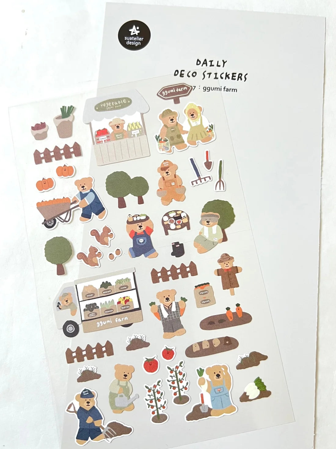 Suatelier - Ggumi Farm Sticker Sheet
The Ggumi Farm sticker sheet from Suatelier captures the charm of farming and the inviting atmosphere of your favorite neighborhood market. Known for their soft colors and playful aesthetic, Suatelier stickers add an instant dose of warmth and whimsy wherever you place them.
Package measures approx. 8" x 3.5"
Includes 1 sticker sheet
