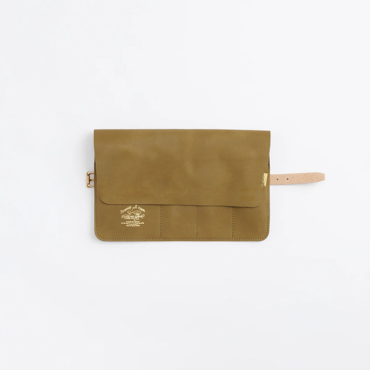 The SUPERIOR LABOR Glove Leather - Roll Pen Case
The discontinued pen roll has returned with a refined new design. A brass tag accents its raw-cut edge, while the logo inside is finished with elegant gold foil. The result is a fresh look that feels both light and sophisticated.
Pockets in varying sizes hold pens of different types, and when you’re done, simply roll it up and take it with you.
A pen case that combines the joy of displaying your favorite pens with the practicality of ca