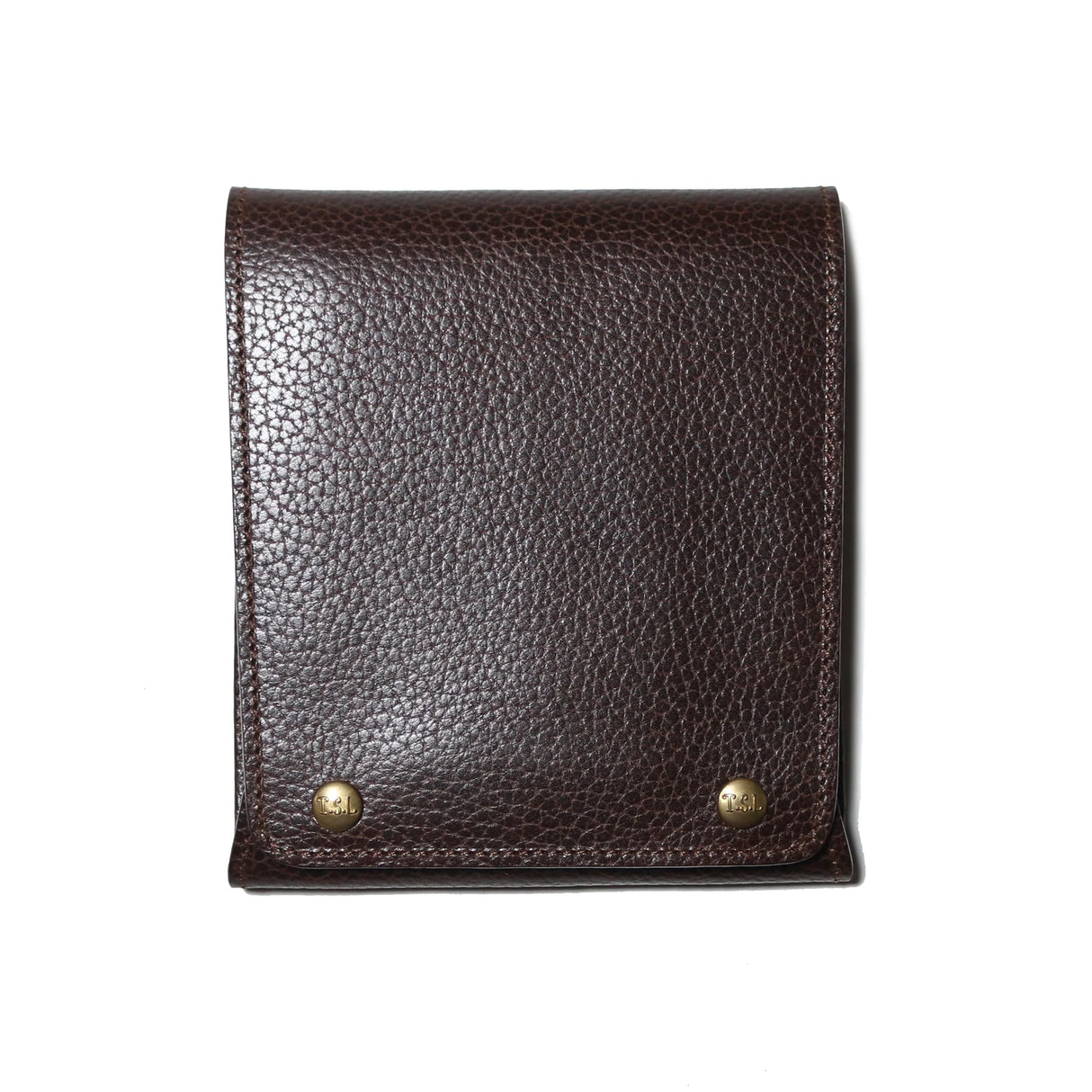 This case for fountain pens can hold five pens individually.
Lined with pig suede for a luxurious look and feel, your precious pens will be well protected and carried.
The buttons are original, made of solid brass and stamped with T.S.L.
SIZE : L13cm × H15cm
COLOR : Camel / Brown / Black
MATERIAL : Cow leather
Leather Products:
The leather used in this product is natural leather.
We do not use scratches that lead to tears or rips, but we use scratches and wrinkles that are originally