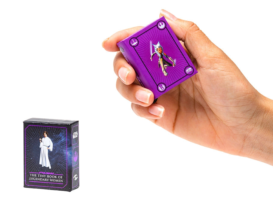 Hold thrilling adventures in the palm of your hand, with this pocket-sized tribute to incredible Star Wars women! The perfect gift for any Star Wars fan, this tiny book is a fun homage to the indelible women of the Star Wars galaxy.
BELOVED MOMENTS IN THE PALM OF YOUR HAND: With its 1.34” x 1.73” size, this tiny book packs a galaxy’s worth of adventure into a pocket-sized format.
ALL OF YOUR FAVORITE CHARACTERS: Star Wars: The Tiny Book of Legendary Women features art and quotes from Leia Organa, Rey Skyw