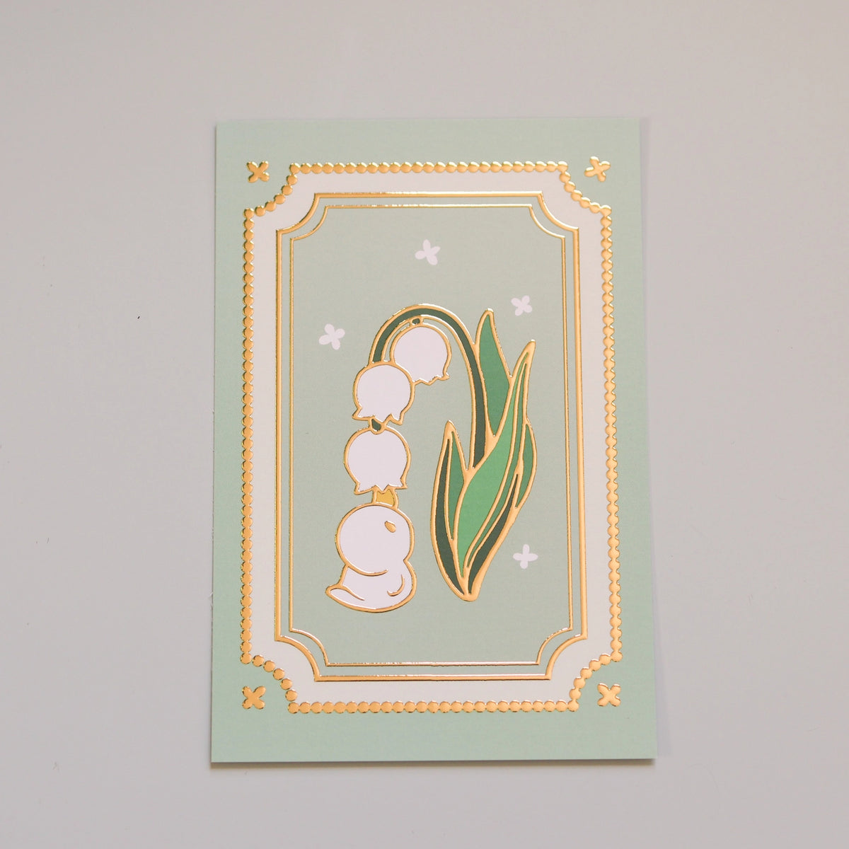 Thousand Skies - Lily of the Valley Postcard
A playful and colorful illustration to brighten someone's day.
• 4 in x 6 in postcard
• Matte finish with gold embossing
• Heavy Cardstock
Please consider that monitor calibrations are all different. The color you see might slightly differ from the photo.
Design ©Thousand Skies
