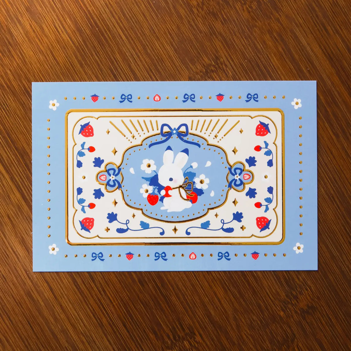 Thousand Skies - Strawberry Bunny Postcard
A playful and colorful illustration to brighten someone's day.
• 4 in x 6 in postcard
• Matte finish with gold embossing
• Heavy Cardstock
Please consider that monitor calibrations are all different. The color you see might slightly differ from the photo.
Design ©Thousand Skies