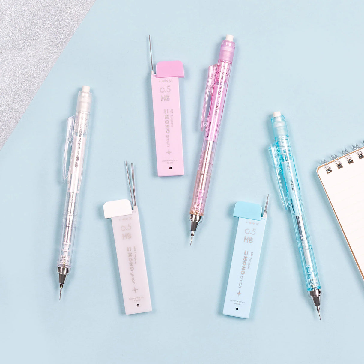 The Tombow Shimmer Stationery Set brings together four MONO favorites in a cohesive, shimmering design that adds a bit of shine to everyday stationery. Each set is thoughtfully curated to include the essentials you reach for most, all in a matching finish that feels special without sacrificing performance.
The MONO Graph Mechanical Pencil features Tombow’s shake mechanism for quick lead advancement and a shake lock to prevent accidental extension. The MONO Eraser delivers clean, precise erasing, while 0.5
