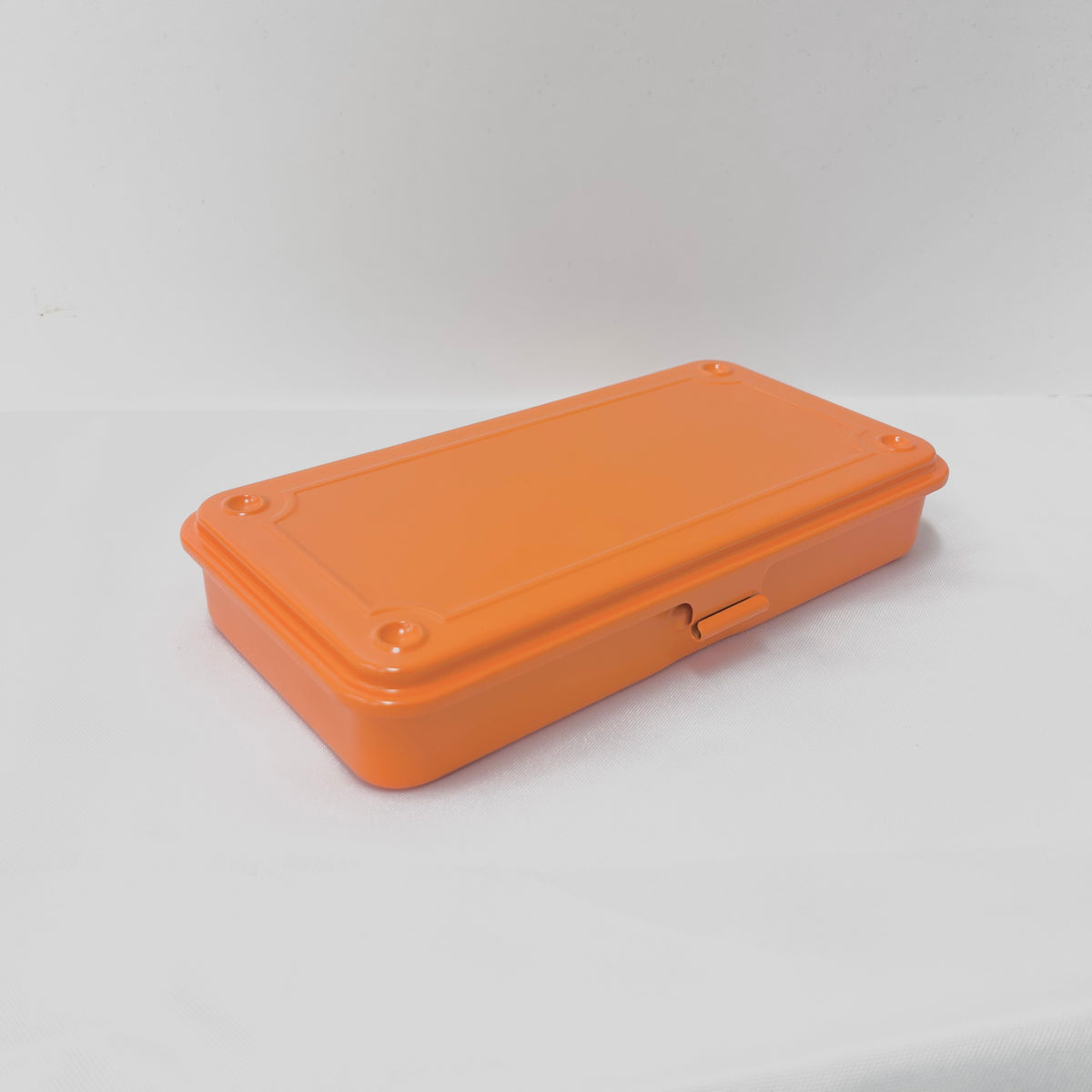 Toyo Steel Stackable Storage Box T-192 - Orange
The Toyo T-192 toolbox is a slim, versatile storage solution, perfect for organizing small items like stationery, accessories, or tools.
Steel Storage Box with flat lid, made from one piece of steel, resulting in no sharp edges. Can be stacked securely due to the negative / positive imprints on the top and underside. Use for art supplies, make-up, nail polish, teas, travel documents - the possibilities are endless.