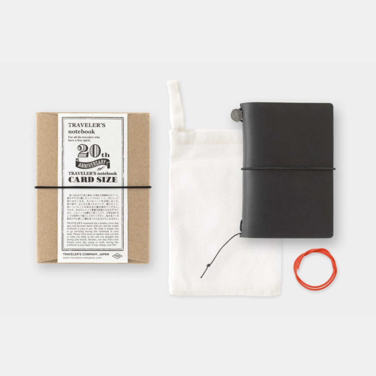 To commemorate this 20th anniversary, we’ve created a new size of TRAVELER’S notebook.
It is TRAVELER’S notebook Card Size. This TRAVELER’S notebook is always with you, even in your daily life. Whether it’s a sudden idea, information you learned or overheard, or something important you don’t want to forget— whenever and wherever you feel like writing, you can quickly grab the notebook and jot it down.
This set includes TRAVELER’S notebook Card Size, Refill Notebooks, Cotton Zipper Case, Kraft Paper Folder