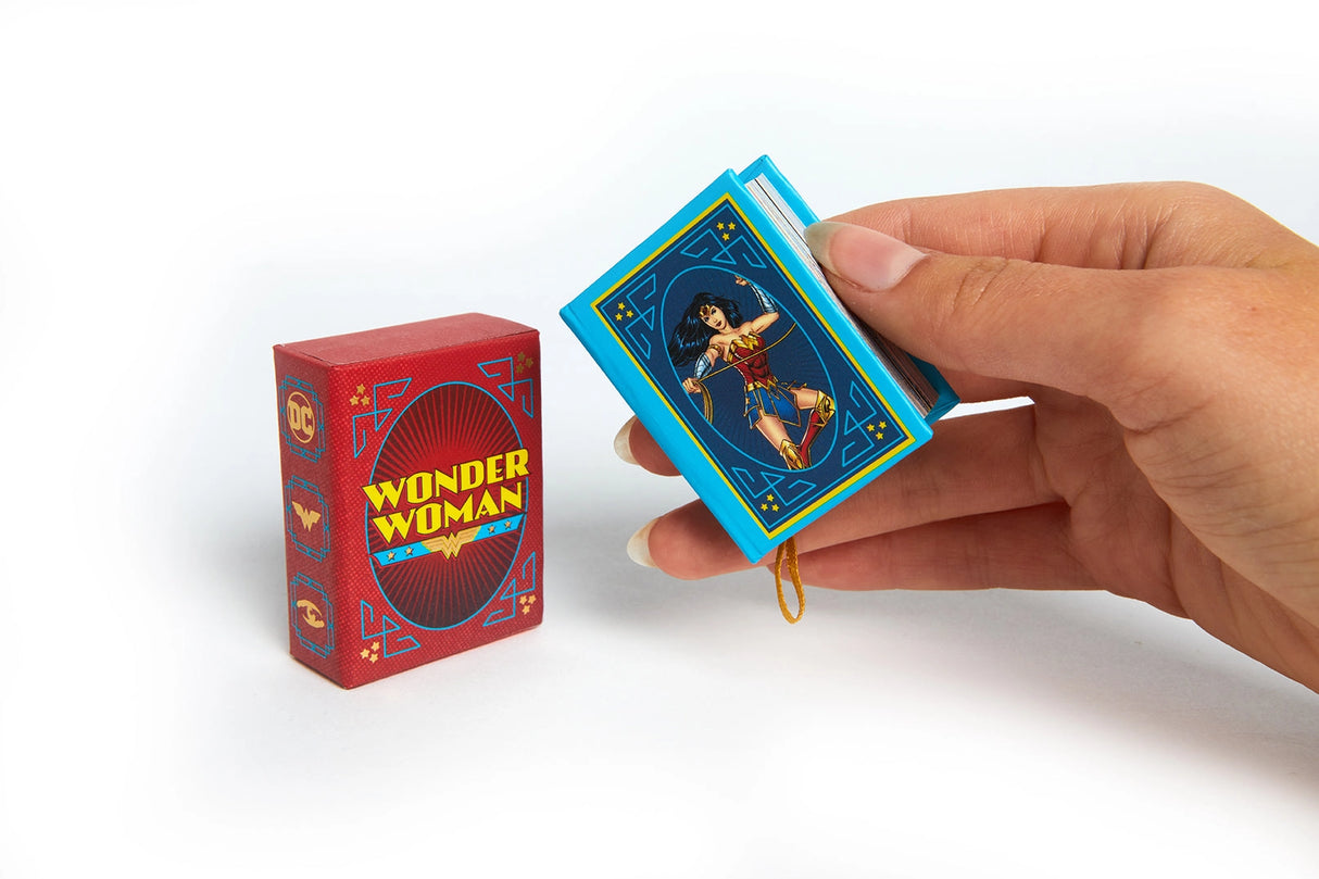 Since her debut in All Star Comics in 1941, Wonder WomanTM has endured as a beacon of strength, truth, and peace. Now, fans of the Princess of the Amazons can rediscover her best moments in this miniature art book.
Features & Highlights:
Empowering quotes to inspire Wonder Woman fans everywhere
Iconic moments in Wonder Woman’s comics history, including covers, panels, and other iconic art spanning nearly 80 years of Wonder Woman comics
Pocket-Sized, this book fits right in your pocket, perfect for Ama