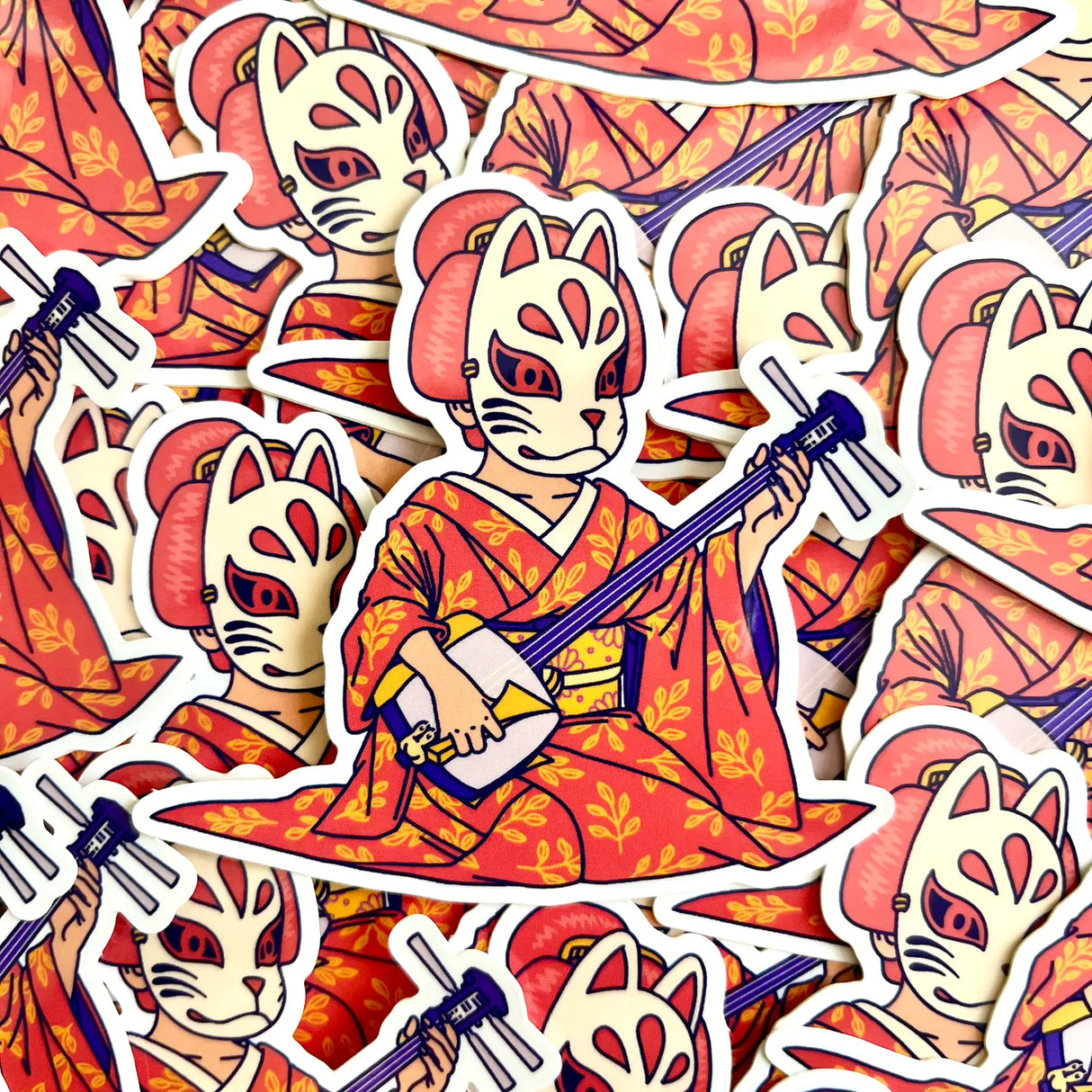 Here is Ina, one of our original characters inspired by Japanese pop culture. Like her father - the famous wrestler Great Kitsune - she never takes off her kitsune mask (kitsune means "fox" in Japanese). Her name is a tribute to the goddess Inari.
• Vinyl sticker
• 7.8 × 7.5 cm
• PVC-free
• UV varnish
• Suitable for outdoor use
• Printed in Sweden