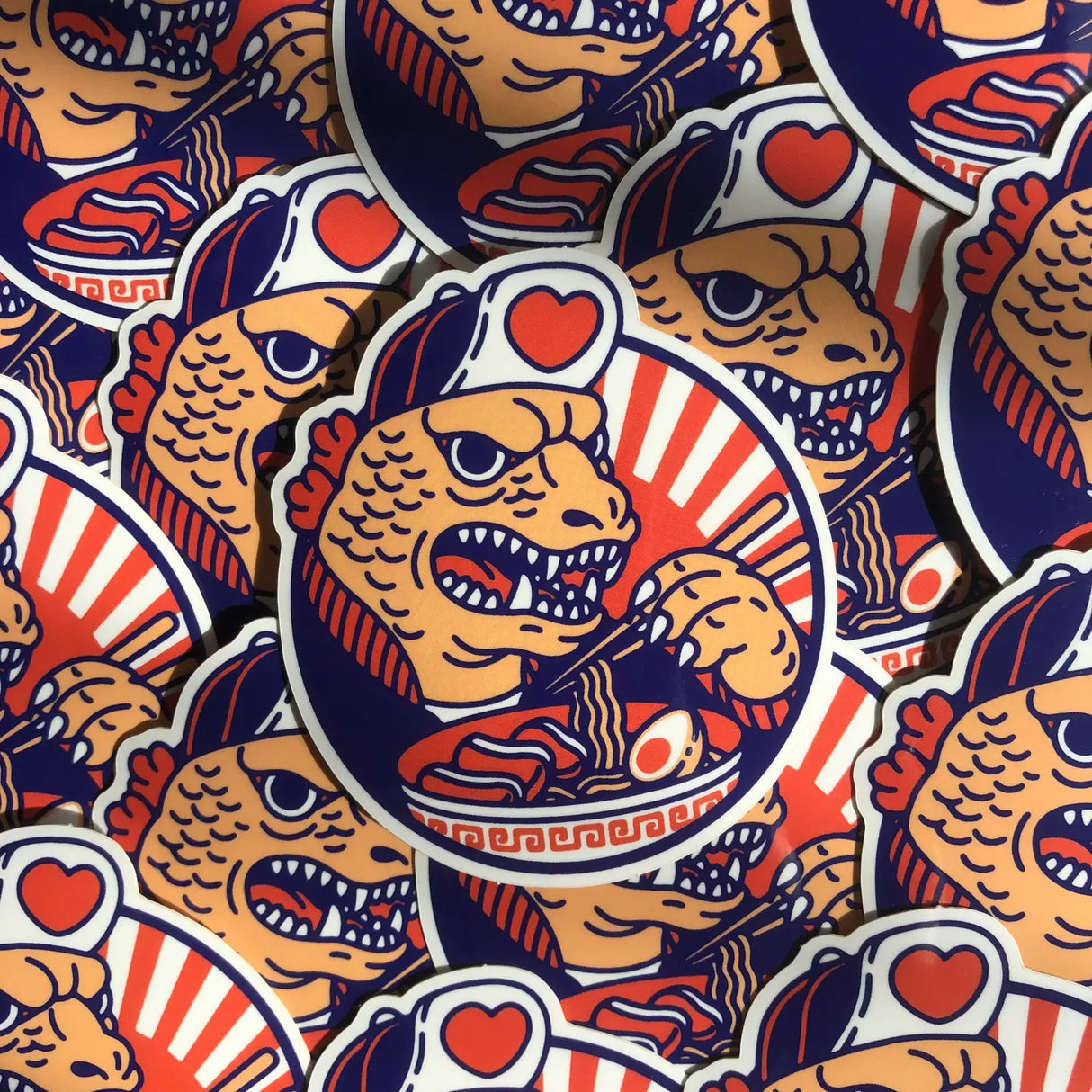 Meet Tonko, one of our original characters inspired by Japanese pop culture. Tonko is a human-sized kaiju, which is rather unusual since kaiju are giant monsters.
Its name comes from the word tonkotsu which refers to a type of ramen broth.
• Vinyl sticker
• 7.5cm (approx. 2.95")
• PVC free
• Anti-UV varnish
• Can be used outside
• Printed in Sweden