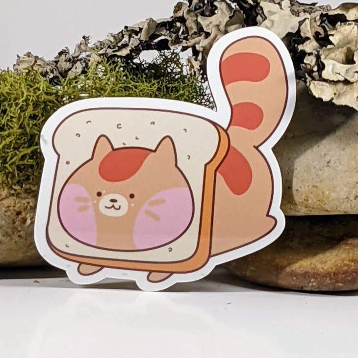 Pegatina inspirada en la comida con una linda tostada de gato