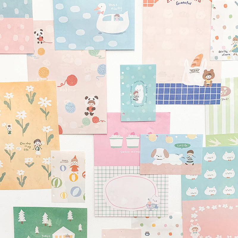 Drift into a soft, dreamy aesthetic with the Gentle Dreams A5 Colored Notepad from Molinta. Featuring 5 sets of 12 different designs — a total of 60 beautifully printed sheets — this notepad is perfect for journaling, letter writing, crafting, gift wrapping, and everyday notes. Each page carries a gentle, calming design that adds a touch of whimsy to anything you create.

Specifications: 148mmx210mm
Material: 100g white kraft paper
Full color pages inside
Number of pages: 60