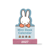 Welcome the new year with this adorable Miffy Desk Calendar (Jan.–Dec. 2027). Each month is printed on a sturdy, die-cut card featuring the iconic bunny in pastel colors and seasonal artwork. Place the current month on the included wooden stand for a sweet, simple calendar reference you’ll enjoy all year long.

• Box: 3.75"w x 5.25"h 
• 12 months (Jan.–Dec. 2027) 
• 13 sheets; 300 gsm acid-free, FSC®-certified paper 
• Shrink-wrapped in paper box 
• Includes sturdy wood stand 

© Mercis bv