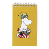 Inspired by Tove Jansson’s beloved world, this collection celebrates the beauty of a slower, gentler way of living where simple pleasures like a warm cup of tea, a quiet walk, and time spent with friends mean everything. Each piece reflects the spirit of Moominvalley: thoughtful, whimsical, and rooted in everyday joy.