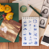 Inspired by Tove Jansson’s beloved world, this collection celebrates the beauty of a slower, gentler way of living where simple pleasures like a warm cup of tea, a quiet walk, and time spent with friends mean everything. Each piece reflects the spirit of Moominvalley: thoughtful, whimsical, and rooted in everyday joy.