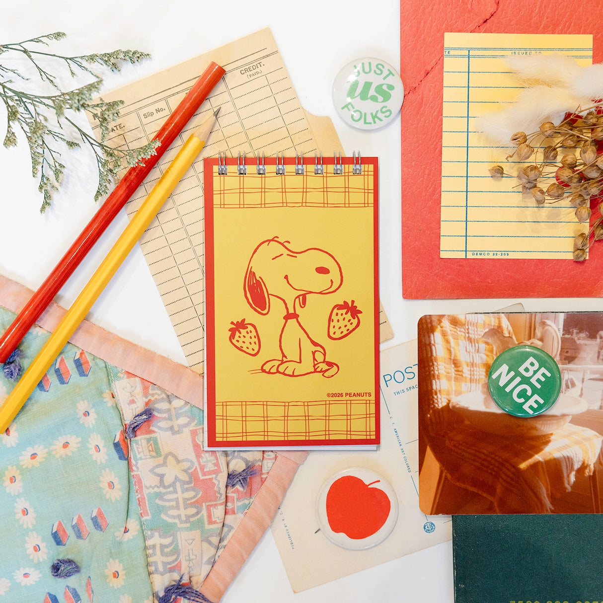 A nostalgic nod to the stationery aisle—those tiny spiral notebooks you’d flip through while your mom checked out at the local five-and-dime. These vintage-style memo pads are straight out of the 1980s, reimagined with photo-real backgrounds and everyone’s favorite beagle doing what he does best: being adorable.