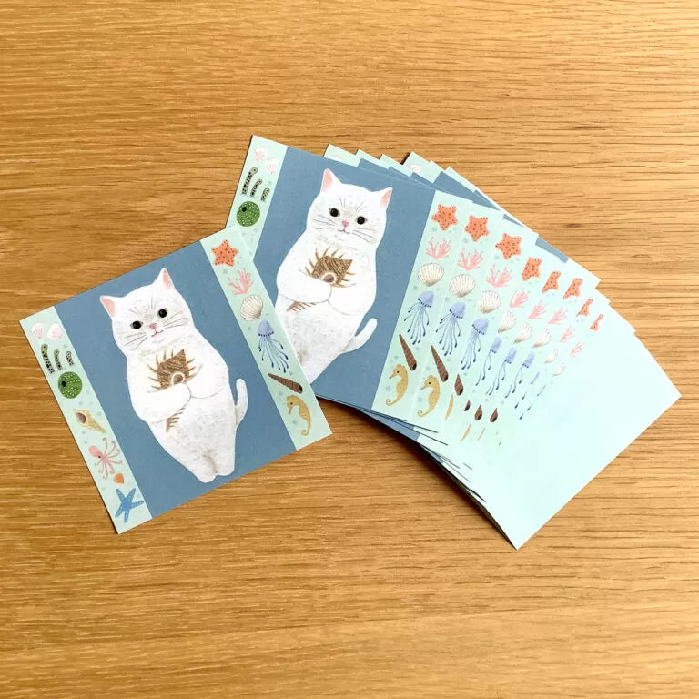 4legs Cat Memo - New #3 Shiro-Neko

Featuring charming watercolor of a cat holding a shell from Japanese illustrator 4legs

It is a convenient size that is not too big or too small.&nbsp;Please use it&nbsp;as a communication tool for small thank you and announcements.&nbsp;There are no lines on the front side, so&nbsp;you can use it freely as&nbsp;a shop card or business card&nbsp;with stamps and stickers&nbsp;as well as memos and letters.&nbsp;It is a great gift for people who like paper.&nbsp;The gorgeous