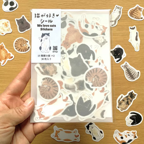 I drew 15 kinds of cute cat gestures one by one and made them into flake stickers.&nbsp;There are two pieces of each, so please enjoy using one, collecting one, or giving it to
a friend!&nbsp;It comes with a postcard-sized cat illustration paper as a bonus!

30 flake stickers (2 sheets × 15 types)
1 bonus illustration paper