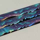 AdrianSlothArt - Aurora Mountain Landscape Holographic Foil Washi Tape

Washi tape with holographic foil highlighting the snow on the mountains, reflecting the northern lights in the night sky.

Details:

15 mm x 10 m
holographic foil washi tape