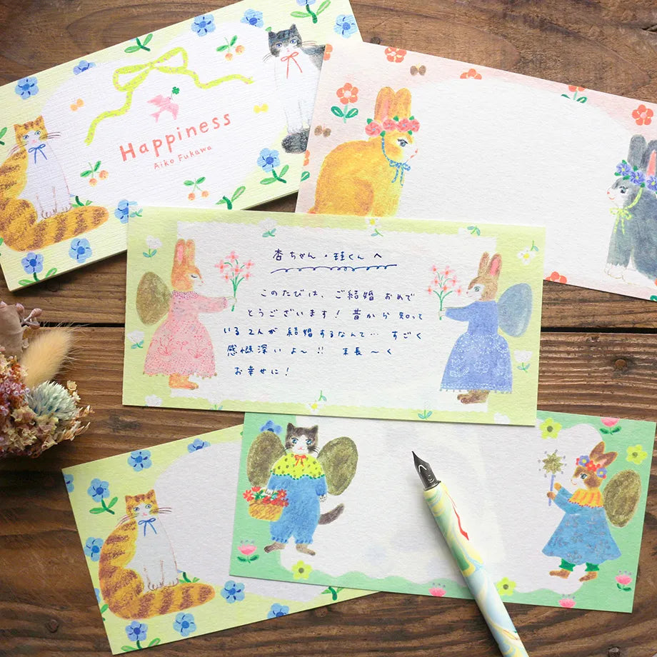 Illustration by Aiko Nukawa, featuring animals dressed in stylish clothes and cute flowers.
Since it uses fluorescent ink, the bright and vivid colors are adorable. Perfect for writing a small letter or thank-you note.

✨ Product Features

4 unique designs featuring whimsical animals and floral motifs
Perfect for short letters, thank‑you notes, or gift enclosures
Printed with fluorescent ink for vivid, eye‑catching color
Made with Mino washi, a traditional Japanese paper known for its soft texture and beaut