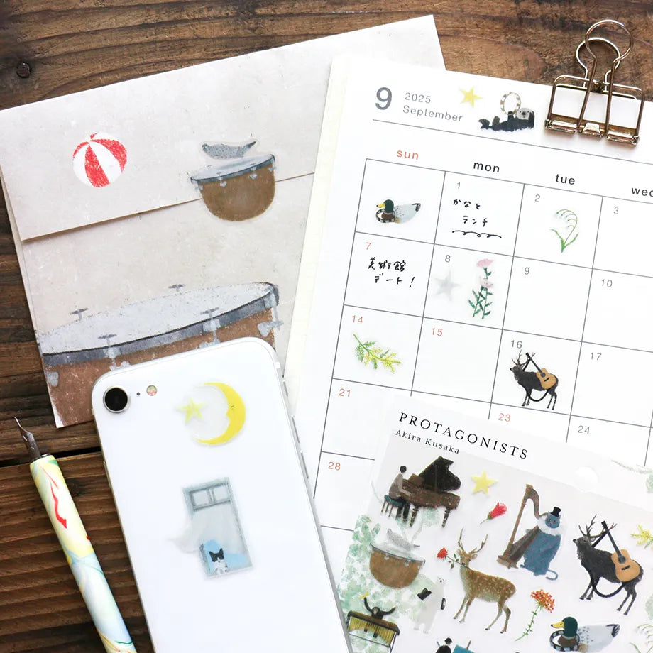 Stickers of illustrator Akira Kusaka. This sticker sheet is packed with beautiful drawings of animals playing instruments, perfect for any music lover.


Printed on PET material, the stickers have a smooth, durable finish that’s easy to peel and place - great for both everyday use and special projects.

✨ Product Details

Smooth, durable PET sticker material
Perfect for planners, journals, scrapbooking, and cardmaking
Backing Sheet Size: 141 × 188 mm
Sticker sheet size: 138 × 170 mm