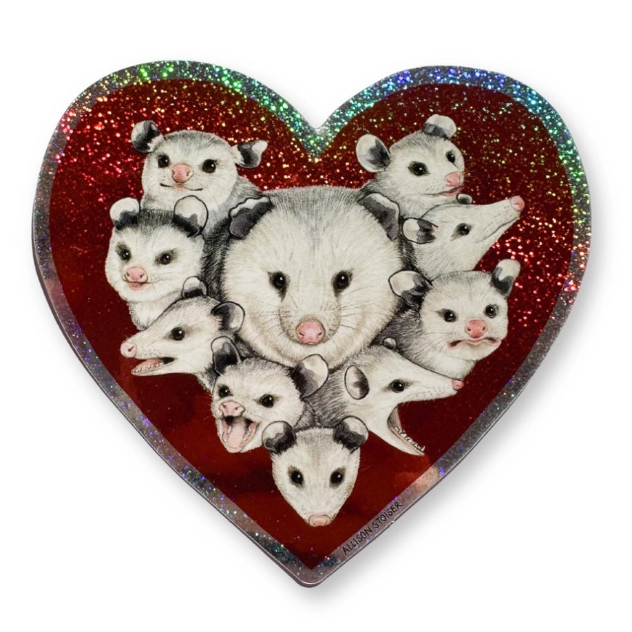 This heart-shaped glittery weatherproof sticker features my illustration of a mom opossum surrounded by her babies.

This die-cut gloss 4” vinyl sticker is durable, weatherproof, and perfect for water bottles, notebooks, laptops, bikes, and all sorts of other surfaces! Make sure to clean and dry the surface thoroughly before applying.