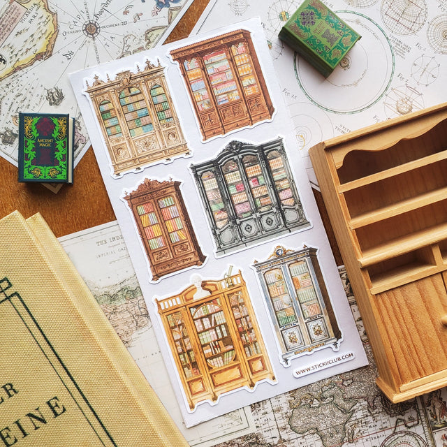 📚 Discover your next literary journey in this quaint vintage library, where shelves of captivating reads await. Whether you’re advancing your knowledge or escaping into an adventure, these are perfect for your reading journal. This sheet featuring magnificent glass-enclosed bookshelves will fill any book lover with endless joy.

Top Coating: None

Adhesive Layer: Paper

Backing Layer: Clear PET

6.69" x 3.54". Weight - 0.03lbs.

1 sheet included