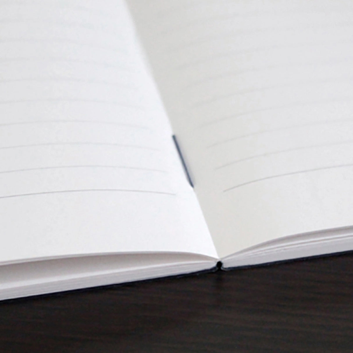 High-quality notebooks are ideal for jotting ideas, taking notes, sketching, making lists, and more. They are perfect for use at home or the office.&nbsp;

It contains white, ruled, acid-free paper.
Comes in a variety of colors, including white, ivory, sky blue, red, aqua blue, green, charcoal, mustard yellow, and navy.
The cover is made from thick, brightly colored specialty paper.&nbsp;
Sturdy thread binding allows the notebook to lay flat, making writing a breeze.&nbsp;
The exterior features a classical 