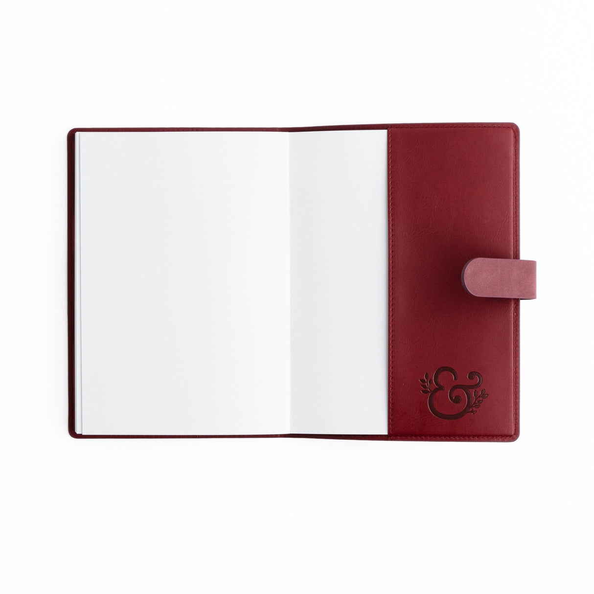 Step into a world where every page feels like the beginning of a well-loved tale. The Storybook in Plum Everyday Deluxe System pairs rich, moody color with intricate gold-foil detailing, creating a journal that feels timeless, elegant, and quietly magical.

Designed to elevate your everyday writing, this piece brings the charm of a vintage hardcover book into a modern, functional journaling system—perfect for capturing thoughts, plans, and stories worth keeping.