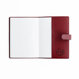 Step into a world where every page feels like the beginning of a well-loved tale. The Storybook in Plum Everyday Deluxe System pairs rich, moody color with intricate gold-foil detailing, creating a journal that feels timeless, elegant, and quietly magical.

Designed to elevate your everyday writing, this piece brings the charm of a vintage hardcover book into a modern, functional journaling system—perfect for capturing thoughts, plans, and stories worth keeping.