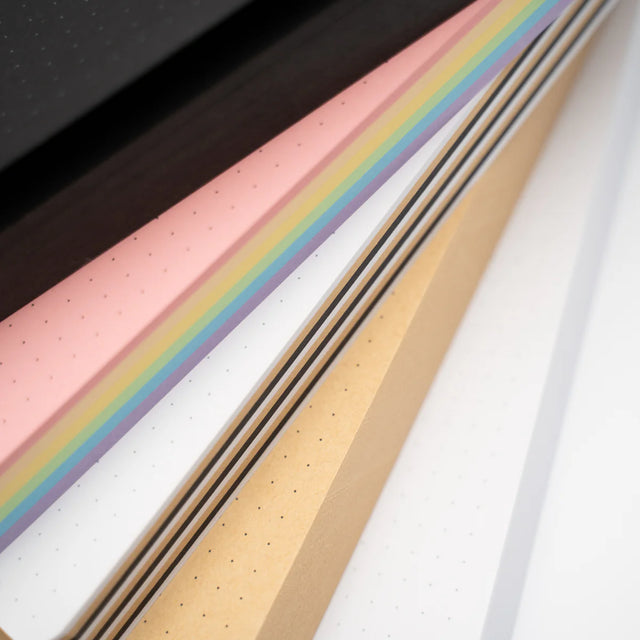 Getting to the end of your notepad?&nbsp;Our notepads are designed to be&nbsp;refillable, meaning you can pick up your favorite&nbsp;Notepad Refill&nbsp;without needing to purchase a whole new set. Crafted with our signature thick dot-grid paper, our notepads are perfect for journaling, planning, note-taking, and creative projects.

Available Colors:

White&nbsp;– the classic pick for everyday use
Black&nbsp;– bold and dramatic for creative contrast
Kraft&nbsp;– natural tones for a rustic feel
Pastel&nbsp;–