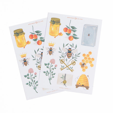 A delightful matte sticker set inspired by traditional beekeeping and vintage botanical art. Featuring crowned bees, honey jars, clover blossoms, decorative keys, honeycomb, and charming illustrated accents, this set adds a whimsical, nature-inspired touch to journals, planners, and creative projects.

✨ Features You’ll Love

Matte finish stickers—perfect for journaling, planners, or creative projects
Includes bees, florals, honeycomb, botanical motifs, vintage accents
High-quality adhesive ensures they sti