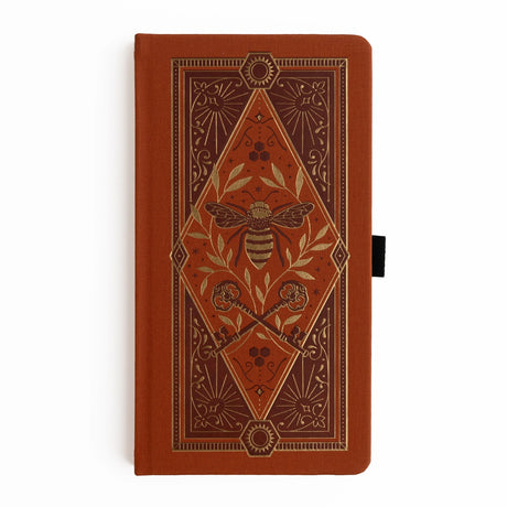 Let your creativity buzz with warmth and intention. The Keeper of the Bees Notebook in Rust blends golden honeybee symbolism with rich, earthy tones, creating a journal that feels both enchanting and grounding. Perfect for capturing ideas, documenting your days, or exploring your imagination—this notebook turns every page into a moment of magic.