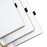 Step into a quiet night where ideas glow like fireflies. The Moonlit Garden Notebook captures the calm of a starry sky framed by wildflowers, inviting you to pause, breathe, and fill each page with inspiration. With soft moonlit tones and delicate detailing, it’s a peaceful companion for journaling, planning, or creative reflection.