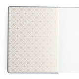 Let your imagination wander into midnight magic. The Storybook Notebook in Navy blends deep, velvety blue tones with ornate gold detailing, creating a journal that feels like an heirloom tale waiting to be written. Whether you're crafting daily reflections or exploring new creative ideas, each page becomes its own enchanting chapter.