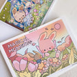 🌿✨ Wander into Whimsy with Magical Moments Coloring Book Vol. 2! ✨🌿

Step into an enchanted world where forest paths lead to secret hideaways and a little magic lingers in the air. Featuring 25 original, full-page illustrations, this collection invites you join Cotton and Pluto on their adventures into cozy woodland cottages, sparkling streams, and whimsical escapes hidden deep in the forests

Whether you're curling up on a quiet afternoon or seeking a mindful creative escape, these charming, nature-inspi