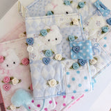 Elevate your journaling experience with these soft and cozy journal covers, designed to protect and personalize your daily diary. Each cover features beautiful blue and pink patterned fabric with thoughtfully sewn details and a secure metal button clasp to keep your pages safe. Includes matching ribbon bookmarks for easy navigation. Available in both A5 and A6 sizes to fit your preferred journal dimensions. The perfect companion for your daily routine and creative practice.
