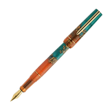 BENU presents the newest Haute Collection — a line of elegant, fashion-inspired pens that blend classic charm with bold, modern flair. The designs include both subtle and vibrant styles, showcasing BENU’s signature glitter and color artistry. Each pen features a faceted body with alternating wide and slender facets, complemented by either gold-plated or chrome-plated trims for a sleek, timeless look.

With a bold orange and teal body streaked with gold, Chic turns heads with runway-ready style. Fashion-forw