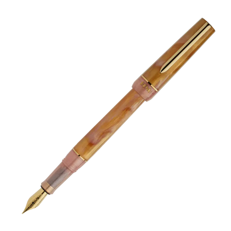 BENU presents the newest Haute Collection — a line of elegant, fashion-inspired pens that blend classic charm with bold, modern flair. The designs include both subtle and vibrant styles, showcasing BENU’s signature glitter and color artistry. Each pen features a faceted body with alternating wide and slender facets, complemented by either gold-plated or chrome-plated trims for a sleek, timeless look.

Lustre pen glows with warm swirls of amber and blush, finished in radiant gold trim.Quietly luxurious, Lust