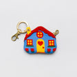 For homebodies on the go! Pop this adorable cottage on your favorite going-out bag for some lace-trimmed, puppy-loving charm. It’s perfect for stashing earbuds or small knick knacks – or just for a sweet reminder that your heart’s always home.