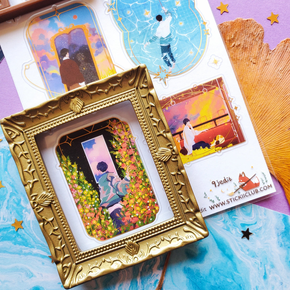 🌙⭐ Wanna get even further away? @9jedit’s got you covered with this stellar celestial set. Sometimes we can only escape in our daydreams and why would we want that to be ordinary? Think cozy reads under crescent moons, ferris wheel rides through cotton candy skies, and portals to worlds that aren’t planet earth. Take us away!

Art by: @9jedit

Top Coating: Gold foil

Adhesive Layer: PVC (plastic)

Backing Layer: Clear PET

6.69" x 3.54". Weight - 0.03lbs.

1 sheet included