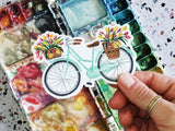 Pegatina de vinilo con diseño de bicicleta y tulipanes en color menta
