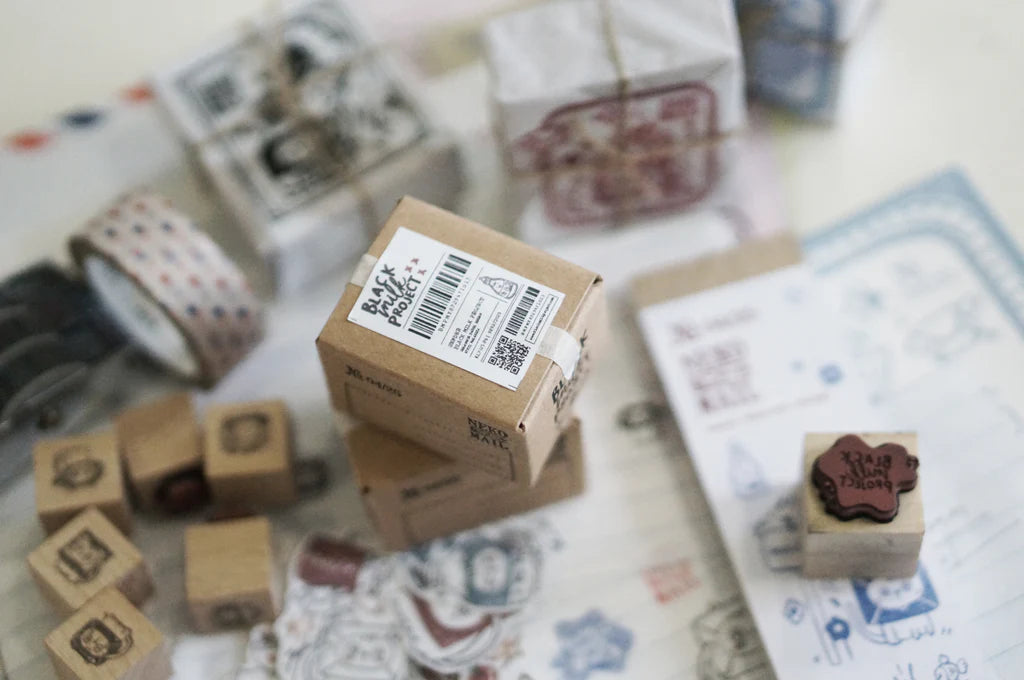 Box size: 4 x 3 x 3 cm

Packed with cuteness, this tiny treasure features 6 different mini stamp designs - plus a PET sticker pack.

The stamps are made of industrial high grade red rubber with the finest details. It is mounted by hand on re-purposed wood, hand-picked from various sources from old furnitures to jungle excursions! As all stamps are assembled, cut, sanded by hand, size and shape may vary slightly. Wood material will differ depending on what the forest elves bring!