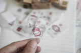 Box size: 4 x 3 x 3 cm

Packed with cuteness, this tiny treasure features 6 different mini stamp designs - plus a PET sticker pack.

The stamps are made of industrial high grade red rubber with the finest details. It is mounted by hand on re-purposed wood, hand-picked from various sources from old furnitures to jungle excursions! As all stamps are assembled, cut, sanded by hand, size and shape may vary slightly. Wood material will differ depending on what the forest elves bring!