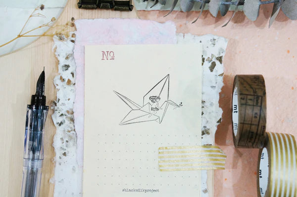 Black Milk Project - Paper Crane Rubber Stamp

Size: 4cm x 4.5cm

The stamps are made of industrial high grade red rubber with the finest details. As all stamps are assembled, cut, sanded by hand, size and shape may vary slightly. Wood material will differ depending on what the forest elves bring!

Stamps might be slightly stained because of quality tests during the process, but it will not affect your stamping color.&nbsp;