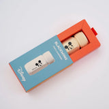 This premium pencil sharpener is made of machined aluminum and sharpens your pencils to a strong, curved point. The cream-colored sharpener features a Mickey Mouse illustration and printed Disney logo on the side in black.