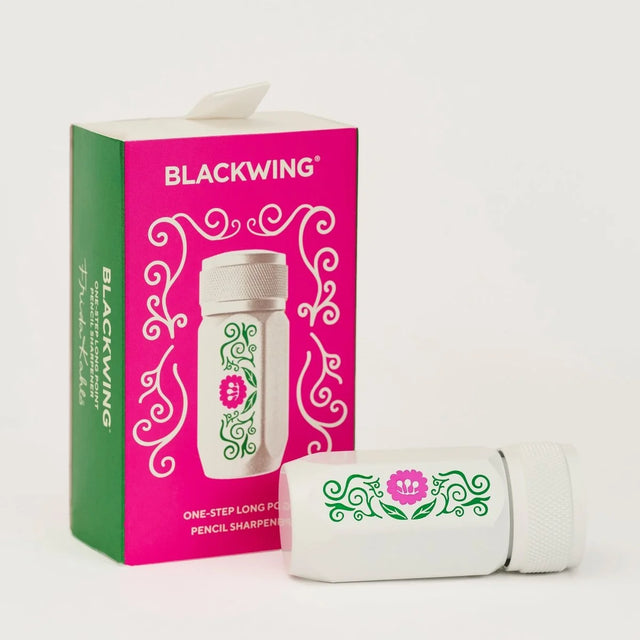 Volume 143 is our tribute to Frida Kahlo. The model number 143 is a nod to the 143 paintings commonly attributed to her over the course of her life.

This limited-edition Volume 143 Blackwing Long Point One-Step Sharpener comes in white with a Frida Kahlo-inspired floral design on the side. The sharpener body is made of durable, machined aluminum, and the sharpening unit features a premium German steel blade for consistent pencil sharpening. The canister can hold three fresh pencil sharpenings before needin