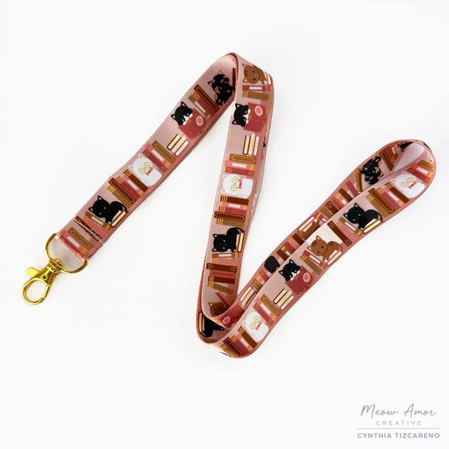 Introducing the adorable Witchy Books Cats Lanyard! This purple lanyard features a witchy book cats design, perfect for all cat lovers out there. Show off your love for felines while keeping your items secure and easily accessible.

2cm X 95cm
double-sided printing
Swiveling Lobster Clasp
