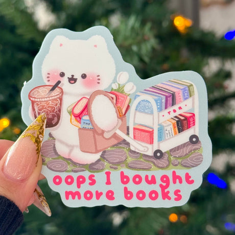 Oops… it happened again 📚💖 This cute bookish sticker features an adorable character hauling even more books with the phrase “oops I bought more books” perfect for readers who can’t resist growing their TBR.

♡ STICKER DETAILS ♡
~ Sticker size: 2.5’’ inches
~ Printed on matte sticker paper
~ Matte Laminate finish ✨
~ ONLY Handwash. This sticker is not dishwasher or microwave safe.